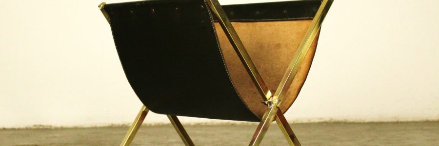 Mid-century magazine rack in the style of Jacques Adnet Brass